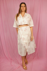 Faces cropped shirt with tie up wrap skirt co-ord.